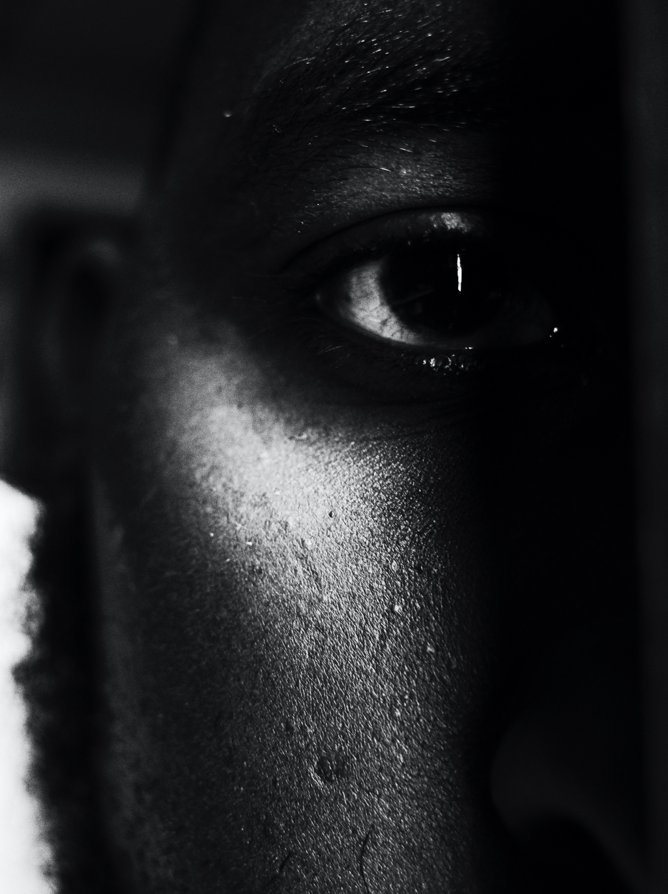 close-up black-and-white photo of author's eye and cheeck